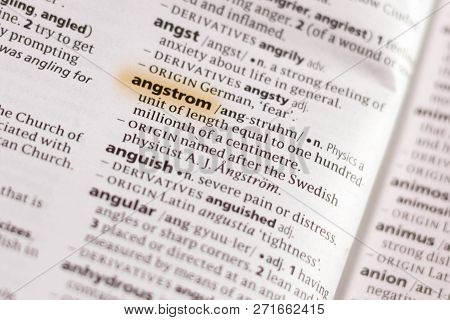 The Word Or Phrase Angstrom In A Dictionary Highlighted With Marker.