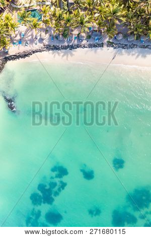 Aerial View Of Amazing Tropical White Sandy Beach With Palm Leaves Umbrellas And Turquoise Sea, Maur
