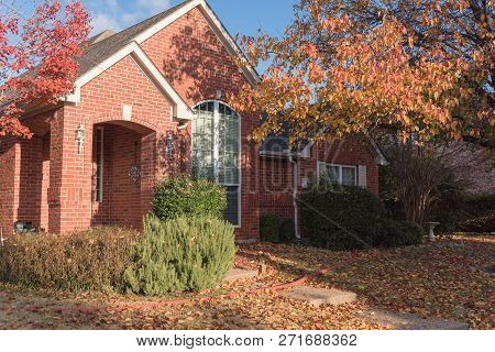 Beautiful Single-family Home Suburbs Dallas With Colorful Autumn Leaves