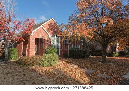 Beautiful Single-family Home Suburbs Dallas With Colorful Autumn Leaves