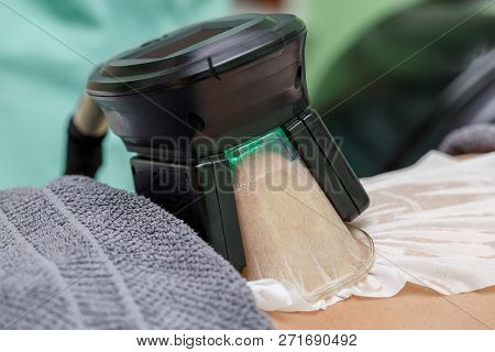 Woman Getting Cryolipolysis Fat Treatment Procedure In Professional Cosmetic Cabinet Or Spa Center