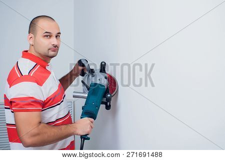 Construction Worker With A Puncher Scream On A White Background.