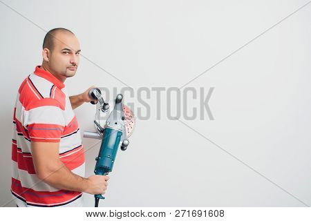 Construction Worker With A Puncher Scream On A White Background.