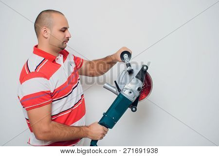 Construction Worker With A Puncher Scream On A White Background.