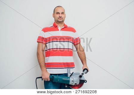 Construction Worker With A Puncher Scream On A White Background.