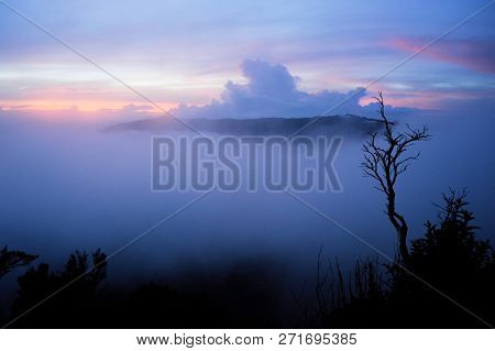 Mountain Landscape In The Clouds At Sunrise - Bromo Volcano View Indonesia