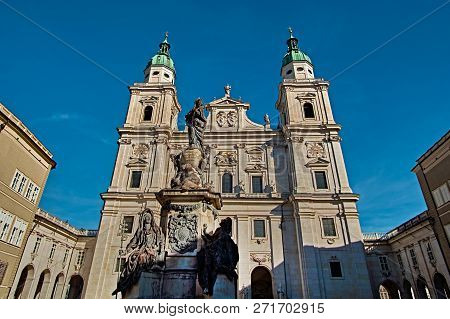 Salzburg Cathedral Or Salzburger Dom With The Fountain Is The 17-th Century Baroque Roman Catholic C
