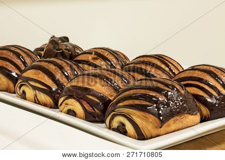 Flakey Chocolate Croissant Grouped On A Plate In A Bakery Fresh From The Oven With Homemade Chocolat