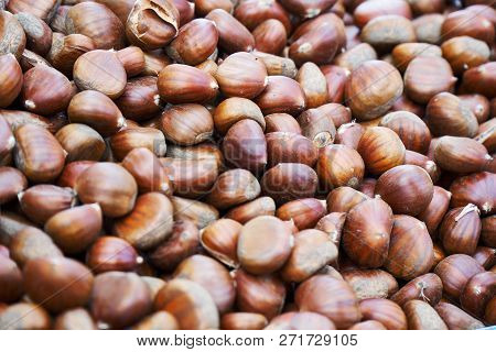 Pile Of Borwn Fresh Chestnuts In Bulck
