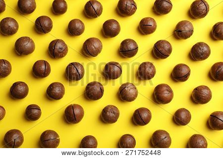 Flat Lay Composition With Organic Macadamia Nuts On Color Background