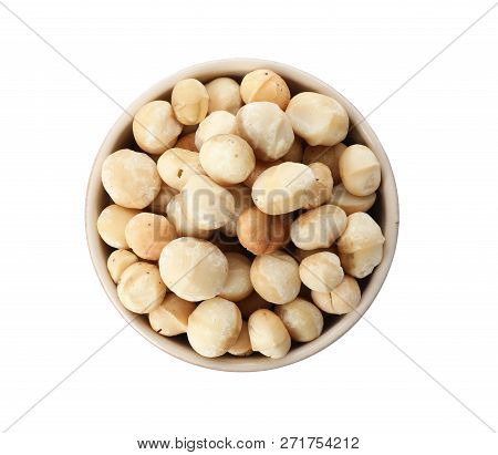 Bowl With Shelled Organic Macadamia Nuts On White Background, Top View