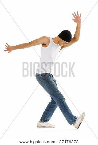 Urban style street breakdancing handstand grab move done isolated on white in studio