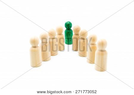 Green Figure Leading Group Of Wooden Figures In Spearhead Formation