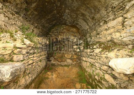 Ruined Walls Of Castle Over The Lake Bafa In A Nature Reserve Situated In Southwestern Turkey