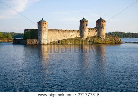 The Medieval Fortress Of Olavinlinna On July Evening. Savonlinna, Finland