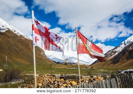 Picturesque Landscape Of Lamaria Church In Aged Rural Community Ushguli Against Beautiful Mt. Shkhar