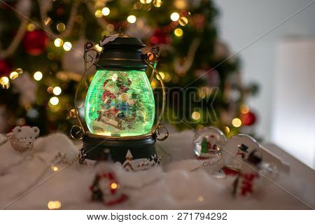 Christmas Decoration, Snow Dome, Globe With Table Decoration, Santaclaus On Sleigh With Child In Win