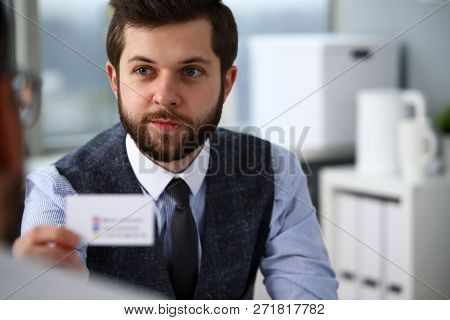 Male Arm In Suit Give Blank Calling Card To Visitor Portrait. White Collar Colleagues Company Name E