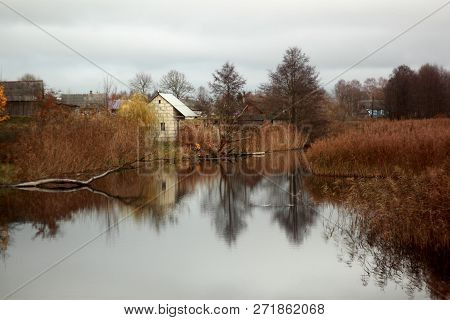 Small City On The River Bank Autumn