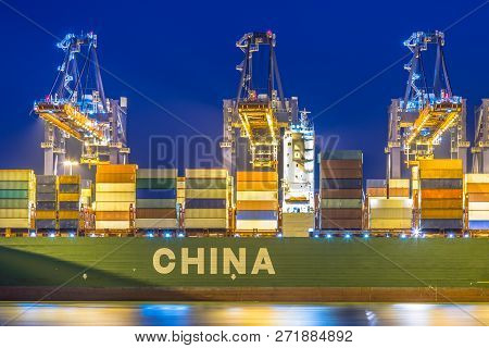Container Ship From China Unloaded At Automated Harbor Terminal In Maasvlakte Europoort Port Of Rott