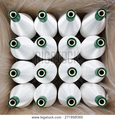 Bobbins With White Nylon Thread. The Polyamide Used For The Manufacture Of Nylon Hosiery.