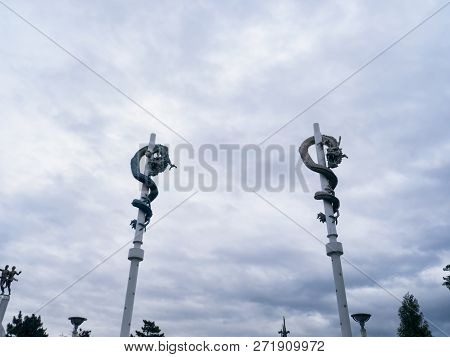 Stone Deagons On Pillars. Sokcho City, South Korea