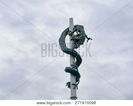 Stone Deagon On The Pillar. Sokcho City, South Korea