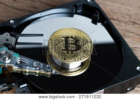 Bitcoin Crypto Currency Digital Money Concept, Shiny Golden Physical Bitcoin Coin With B Sign On Com