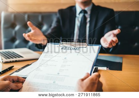 Successful Business Senior Manager During A Job Interview With Employee Young Man Meeting Applicant
