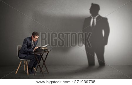 Shadow threatening hard worker man who is afraid