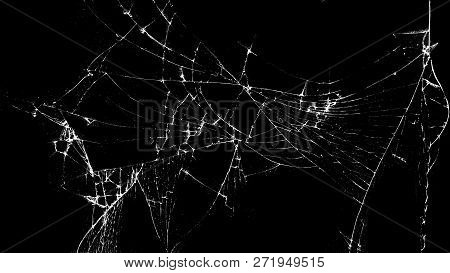 Texture Of Broken Glass On A Black Background. Concept Of Broken Automotive Glass, Screen Phone, Tab