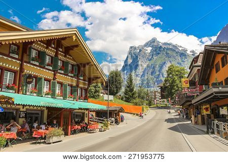 Grindelwald, Switzerland - July, 2013: Dorfstrasse Street In Grindelwald With Parts Of Mattenberg In