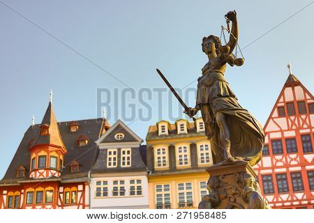 Old Town Square Romerberg With Justitia Statue In Frankfurt Main, Germany With Clear Sky.