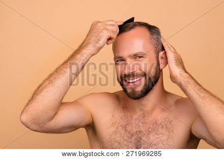 Portrait Of Nice Lovely Cheerful Cheery Positive Bearded Attractive Handsome Guy Combing Grey Hair H