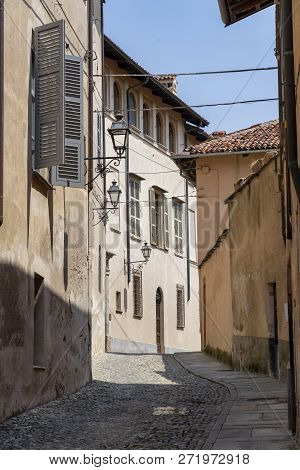 Saluzzo, Cuneo, Piedmont, Italy: Historic Buildings Along An Old Typical Street