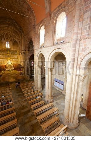 Leon, Spain - June 27, 2017: Parishioners praying in the basilica of san Isidoro.