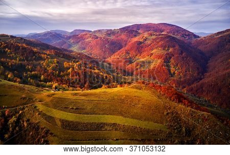 aerial view of Carpathian mountains countryside in autumn morning, Romania