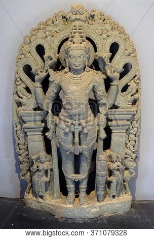 MUMBAI, INDIA - FEBRUARY 14, 2020: Statue of Vishnu from 12th-13th century exposed in the Prince of Wales Museum, now known as The Chhatrapati Shivaji Maharaj Museum in Mumbai, India