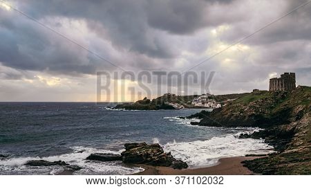 Sa Mesquida Beach In A Stormy Day, And Old British Defense Tower, Abandoned Paradise Beach In Menorc