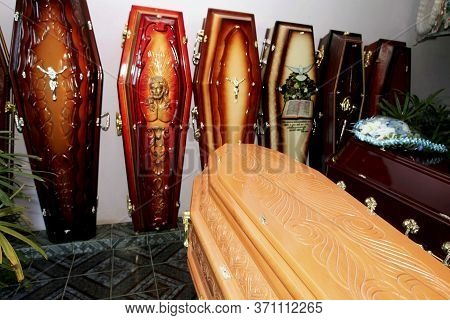 Eunapolis, Bahia / Brazil - March 18, 2009: Funeral Urn Is Seen At Dead Man's Coffin Sale Store In E
