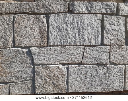 the background of the gray stone walls of new stone