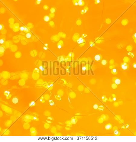 Golden Bokeh Glitter Glowing Backdrop Background. Cirlcles Wall