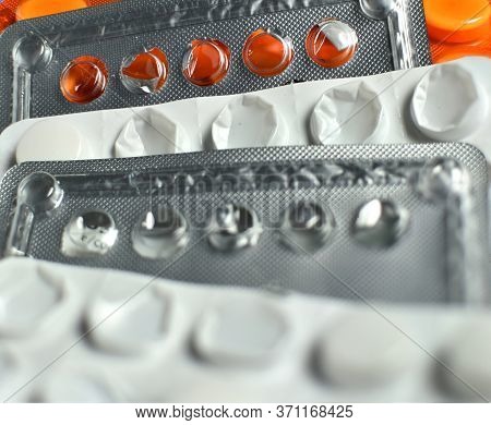Heath, Healthcare Costs, Drugs, Medicines And Pills. Closeup Shot Of A Stack Of Multiple Pill Bliste