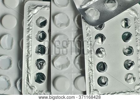 Heath, Healthcare Costs, Drugs, Medicines And Pills. Closeup Shot Of A Stack Of Multiple Pill Bliste