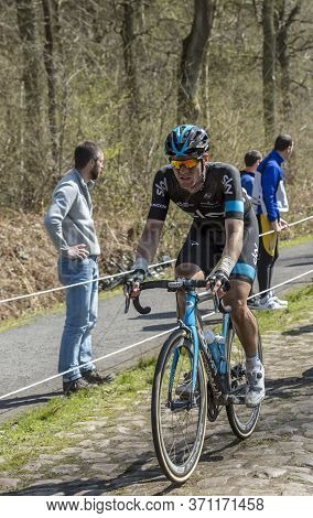 Wallers,france - April 12,2015: The Italian Cyclist Salvatore Puccio Of Team Sky Riding On A Cobbles