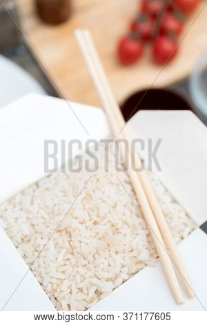Asian White Rice In Paper Box. Cooking Rice Fast Food.