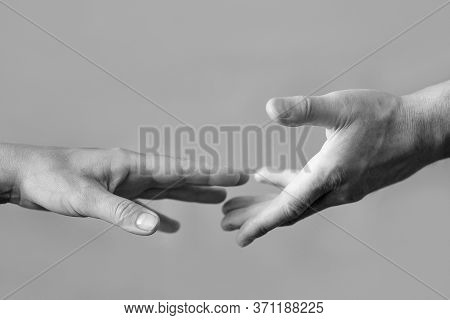 Two Hands Helping Hand To A Friend