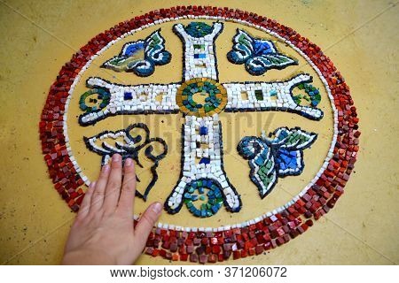Female Hand In Smalt Drawing In Mosaic Workshop. Making A Red Circle With A Pattern Inside. Selectiv