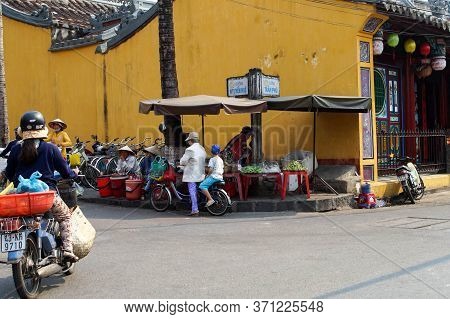 Hoi An, Vietnam - March 25, 2016: Asian Food Traders
