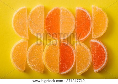 Multi-colored Marmalade Jelly Candys. Dessert Marmalade In The Form Of Lemon And Orange Slices. The 